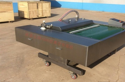 自动滚动式1000型真空包装机