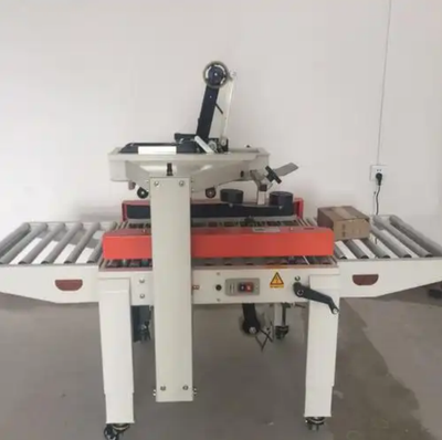 飞机盒自动封箱机